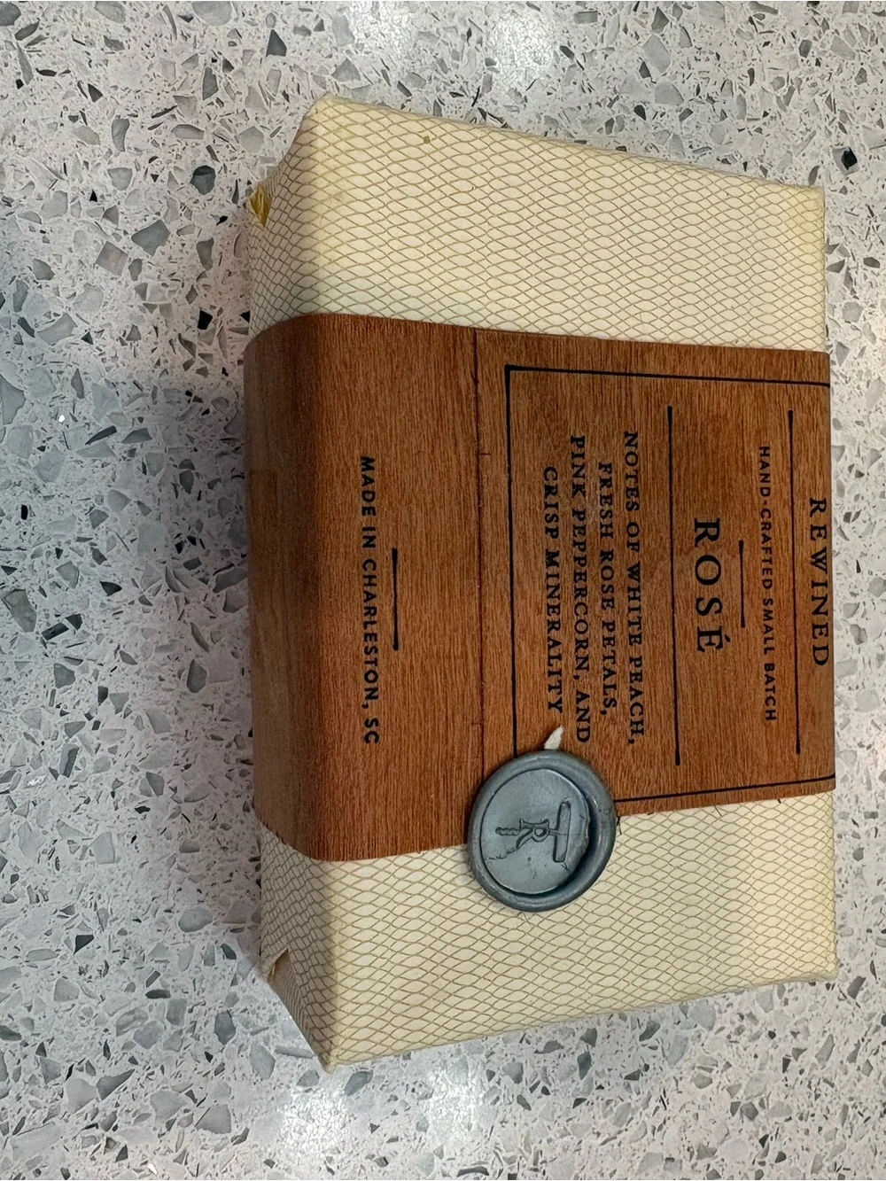 Collection of four assorted wrapped soaps